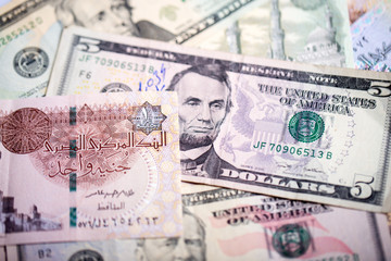 Egyptian pound with dollars banknote..