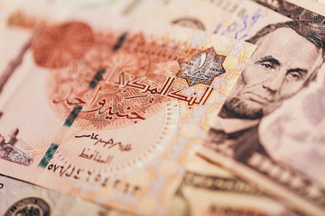 Egyptian pound with dollars banknote..