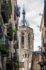 Naklejka premium Narrow street in gothic quarter of Barcelona
