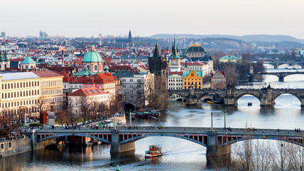 Obraz premium Charles Bridge (Karluv Most) and Old Town Tower, the most beautiful bridge in Czechia. Prague, Czech Republic.