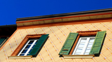 Obraz premium Louver windows and painted texture wall