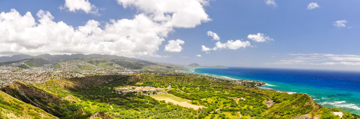 Fototapeta na wymiar XXL panorama view into Diamond Head Crater in Honolulu, Oahu, Hawaii, USA. Seen from the top of Diamond Head, an old volcanic crater, which is a popular tourist hiking destination and easy to hike.
