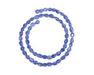 Soft blue violet tanzanite extra quality beads isolated on white background