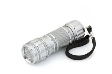 Silver small flashlight (lantern light) isolate on white backgro
