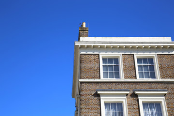 Fototapeta na wymiar Modern stone facade on a sunny day