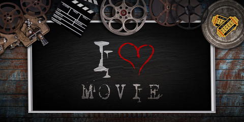 Black board with old vintage movie tools. © Lukas Gojda