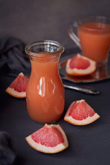 Glass of freshly squeezed grapefruit juice.