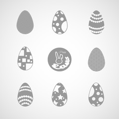 Vector set of gray Easter eggs icons with different patterns on the gradient background.