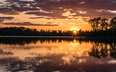 Fototapeta na wymiar A beautiful sunset view over a lake