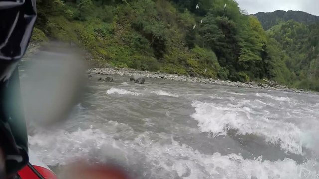 Dangerous rafting on wild mountain river, severe conditions testing team spirit