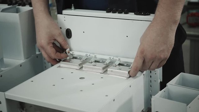 Microchip production factory. Technological process. Assembling the board. Computer expert. Manufacturing. Engineering. Chip. Professional. Technician.