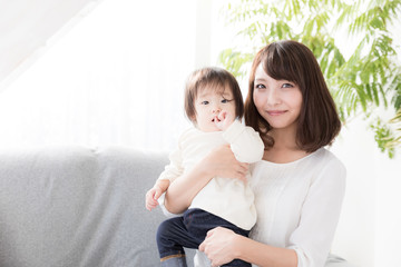 young asian family in living room