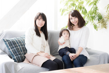 Obraz premium young asian family in living room