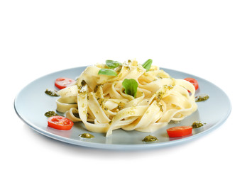 Plate with delicious pasta on white background