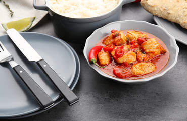 Portion of chicken tikka masala on dinner table