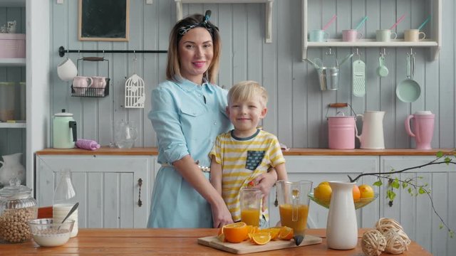 Mom Son Spend Time Holiday Eating Breakfast, mother and boy child on kichen, happy family