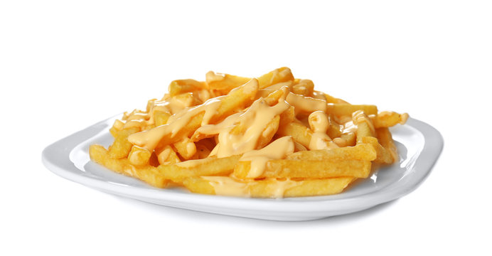 Fototapeta Plate of delicious french fries with cheese sauce on white background