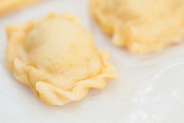 Ravioli Preparation : Raw sealed and decorated homemade ravioli