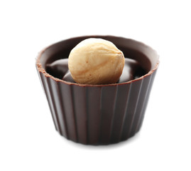 Delicious chocolate praline candy, isolated on white