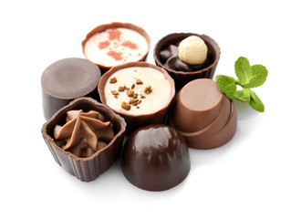 Delicious chocolate candies, isolated on white