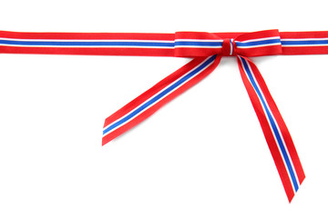 Obraz premium Ribbon bow in colors of Thai flag on white background