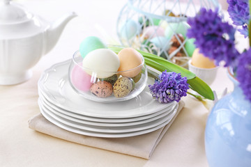 Beautiful Easter table setting  on linen tablecloth