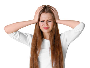 Beautiful young woman suffering from headache on white background