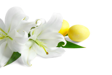 Beautiful composition with lilies and Easter eggs on white background