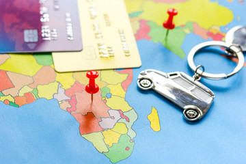 Traveling concept with car and credit card on map