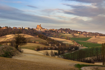 Sunset in the last day of winter. Spring is coming. Monferrato hills, Piedmont, Italy