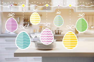 Prepared clean dishes for dinner party on a table in the kitchen
