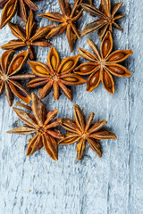 Old, wooden background and star anise