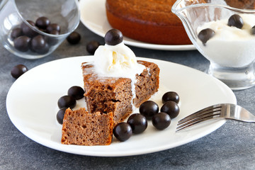 Homemade coffee pie with poppy and ice cream  on a white plate. Selective focus