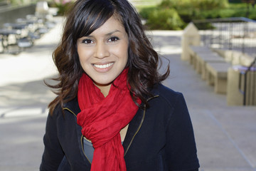 Female Latino college student on campus