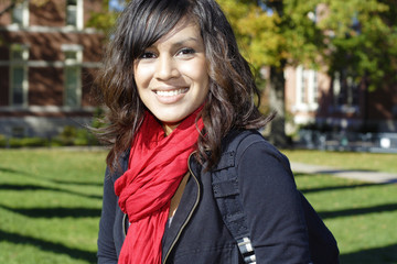 Fototapeta premium Female Latino college student on campus