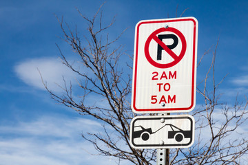 No parking 2 am to 5 am sign, tow zone