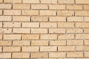 Cream, monochromatic brick wall, full frame
