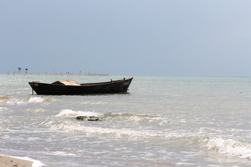 A fishing boat on the shore of the Black Sea.