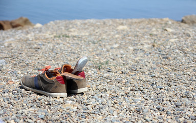 Drying shoes on the shore of the Azov Sea.