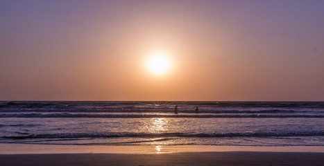 Fototapeta premium Sunset over Arabian sea, Indian ocean, on Arambol beach, Goa, India