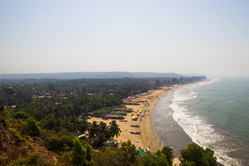 Arambol beach top view, palms, beach and Arabian sea, Goa, India