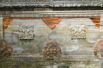 brick wall with stone carving