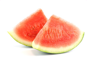 sliced fresh seedless watermelon isolated on white background