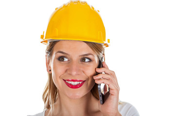 Beautiful female engineer on the phone