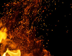 fire flames with sparks on a black background