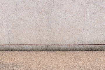 exposed aggregate gravel wall and floor