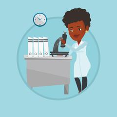 Laboratory assistant with microscope.