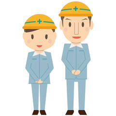 作業着を着たさわやかカップル　笑顔　黄色いヘルメット　お出迎え