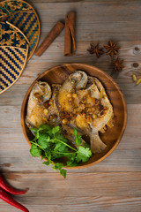 asian grilled fish top down view