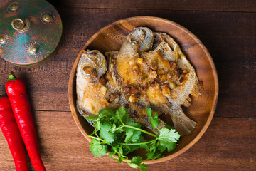 asian grilled fish top down view